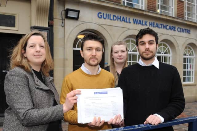 From left, Lalys pharmacy's office manager Kate Harris, manager Ari Loli, counter assistant Sophie Furmedge and dispenser Harry Iliopoulos with the petition
Picture: Sarah Standing (160330-3409)