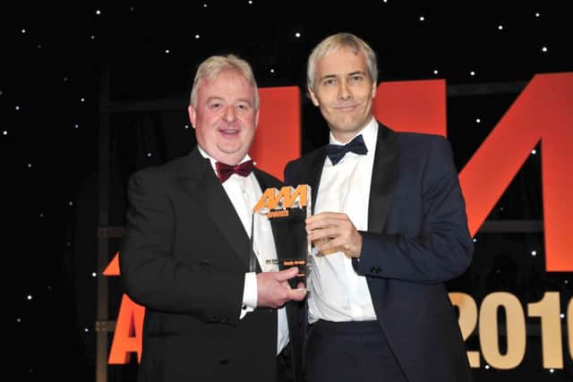 Steve Roberts from Hendy Group receives the award from Robert Hutchinson, Head of Motor Sales from Barclays Partner Finance. PPP-160216-214557001
