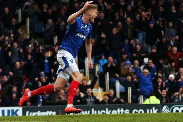Michael Smith celebrates opening his Pompey account. Picture: Joe Pepler