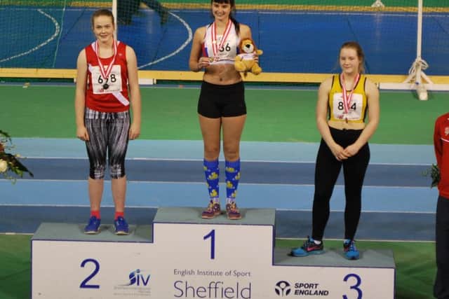 Serena Vincent on top of the podium in Sheffield