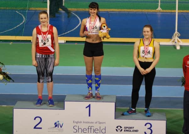 Serena Vincent on top of the podium in Sheffield