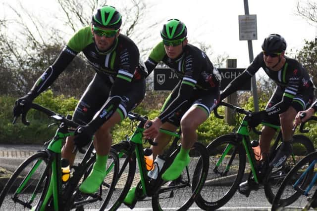 George Stainton-Ellis, right, follows Pedal Heaven professionals Alex Paton and Lloyd Chapman over the top of Portsdown Hill. Picture: Hugh McManus