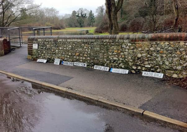 Number plates lined up by the ford in Rowlands Castle Picture: Jim Gibson