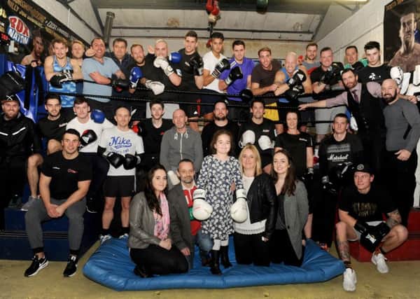 Fundraisers at Bally's Gym in Fratton. Front middle, Maddison Crockford-Reid with her family, from left, half-sister Aimee Bastable, dad Spencer Crockford, mum Shelly Reid and half-sister Jorden Evans  

Picture: Sarah Standing (160167-1578)