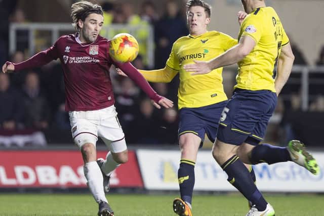 Ricky Holmes in action for Northampton against Oxford on Tuesday night Picture: Kirsty Edmonds