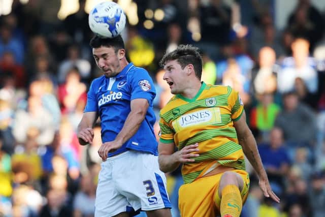 Former Blues striker Ryan Bird challenges Enda Stevens for the ball during Yeovils trip to Fratton Park last October
