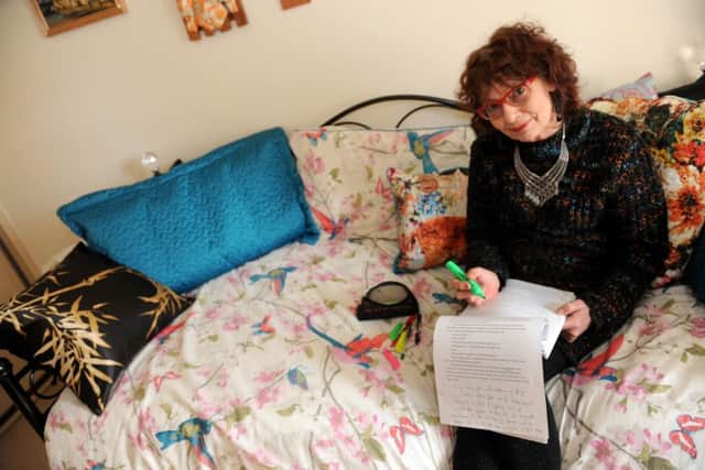 Author Lynne E Blackwood at home editing her novel. Picture: Sarah Standing (160365-) PPP-160218-201259001