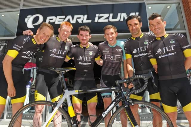 The JLT Condor team and Jon Mould pose for a photography during last season's launch at the Pearl Izumi store in Gunwharf Quays. Picture: Ian Hargreaves (150837-4)