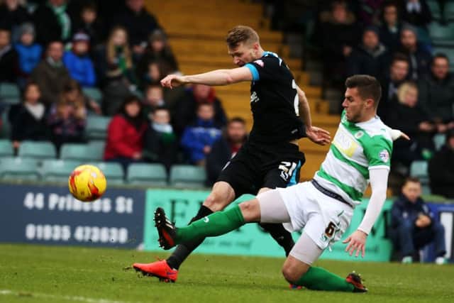 Pompey striker Michael Smith fires narrowly wide against Yeovil Town    Picture: Joe Pepler