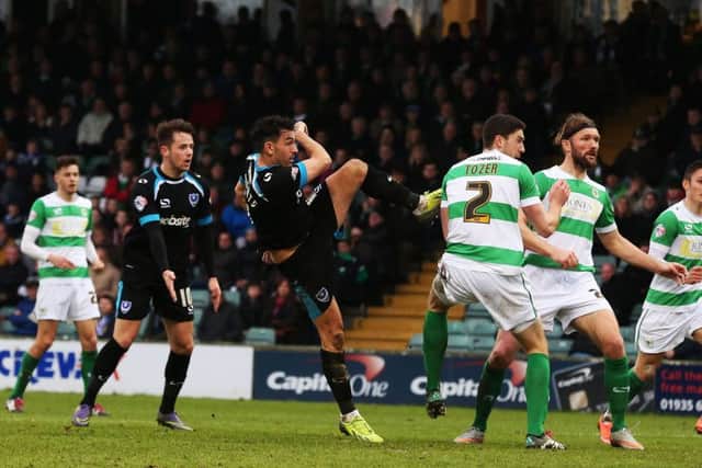 Gary Roberts nets a late equaliser for 10-man Pompey at Yeovil    Picture: Joe Pepler