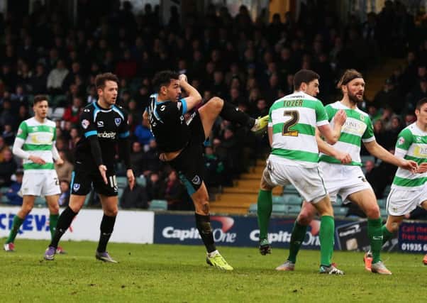 Gary Roberts nets a late equaliser for 10-man Pompey at Yeovil    Picture: Joe Pepler