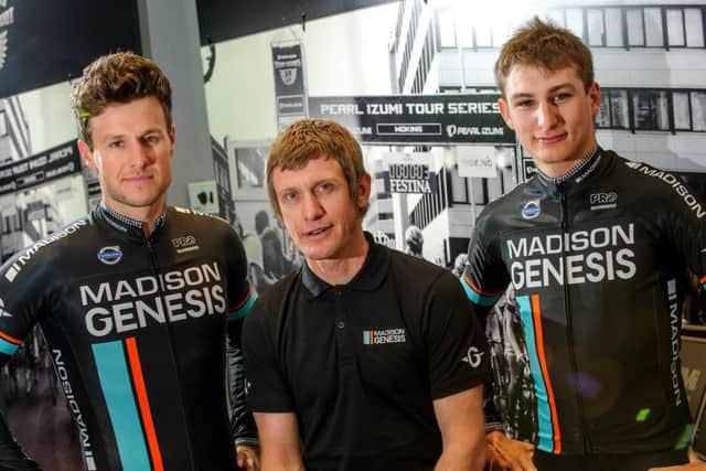 Madison Genesis riders Matt Cronshaw, left, and Tristan Robbins, right, with joint team manager David Povall. Picture: Allan Hutchings (160144-411)