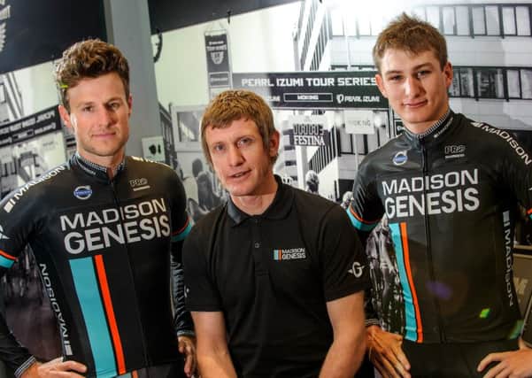 Madison Genesis riders Matt Cronshaw, left, and Tristan Robbins, right, with joint team manager David Povall. Picture: Allan Hutchings (160144-411)