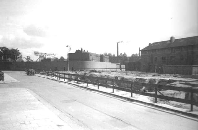 North Street off Queen Street, Portsea, withits bomb site fencing