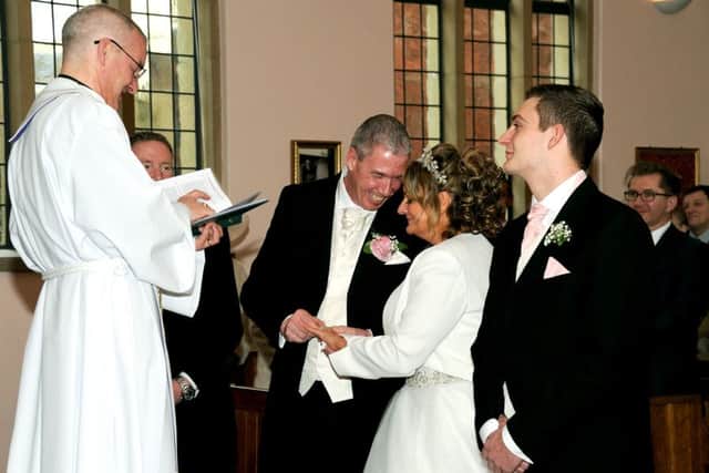 Andy and April Hall exchanged vows at John Pounds Memorial Church, Old Portsmouth. Picture: kimcollinsphoto.com