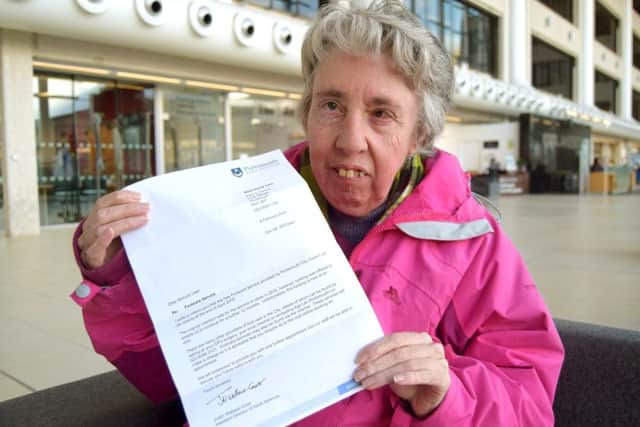 Romaine Hill is angry at the city council's move to axe free foot care for residents