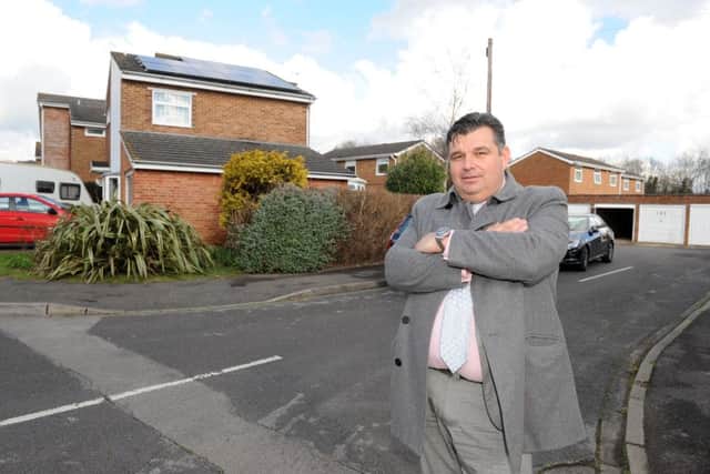 Jim Derry, 43, from Portchester, was issued a parking ticket after parking over a dropped kerb in his road Picture: Sarah Standing (160373-4341)