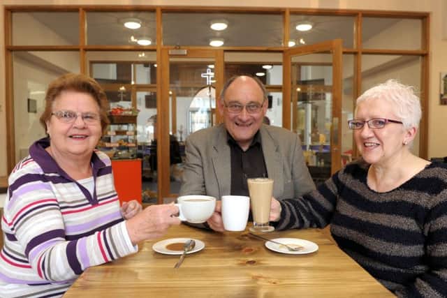 The Rev Cliff Bembridge with Jennie Lee, left, and Sonia Turner
inthe Clock cafe at
Buckland United Reformed Church in Kingston Road, Portsmouth
Picture: Paul Jacobs (160143-11)