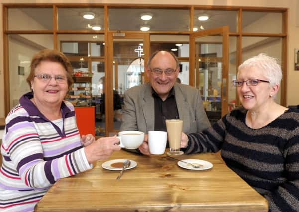 The Rev Cliff Bembridge with Jennie Lee, left, and Sonia Turner
 inthe Clock cafe at 

Buckland United Reformed Church in Kingston Road, Portsmouth 
Picture: Paul Jacobs (160143-11)