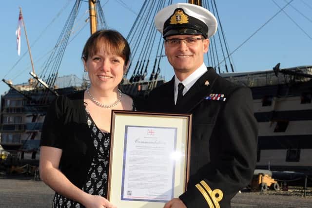 Lieutenant Adrian Gibson with his wife, after receiving the commendation. Picture: LA (Phot) Luron Wright