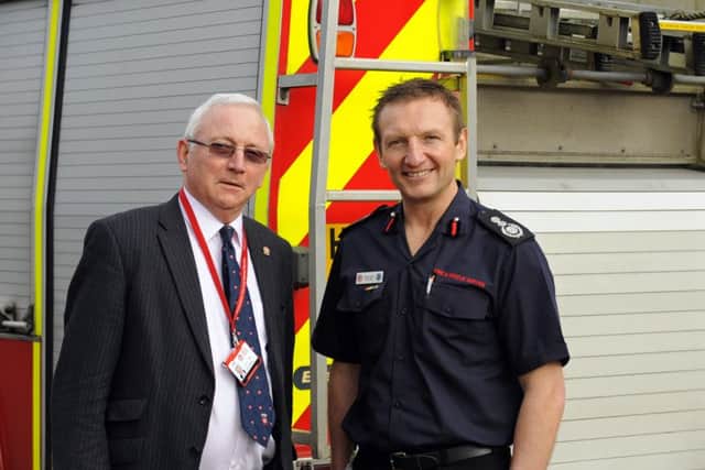 Hampshire Fire Authority chairman Chairman Cllr Chris Carter, left, and Hampshire Fire and Rescue Chief Fire Officer Dave Curry
Picture: Malcolm Wells (160224-6887)