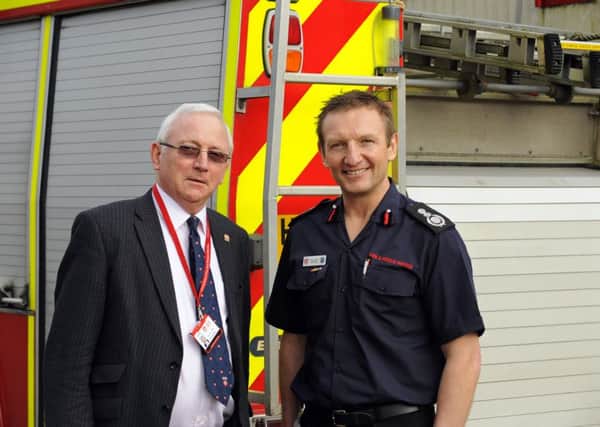 Hampshire Fire Authority chairman Chairman Cllr Chris Carter, left, and Hampshire Fire and Rescue Chief Fire Officer Dave Curry 

Picture: Malcolm Wells (160224-6887)