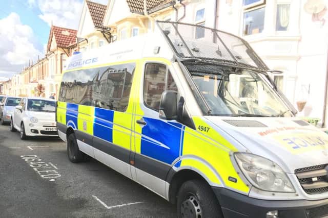 A police van outside a home in Montague Road, Portsmouth, that was burgled
