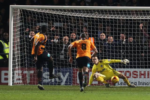 John Akinde beats Ryan Fulton from the penalty spot. Picture: Joe Pepler