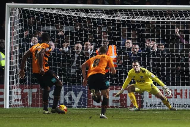 John Akinde beats Ryan Fulton from the spot. Picture: Joe Pepler