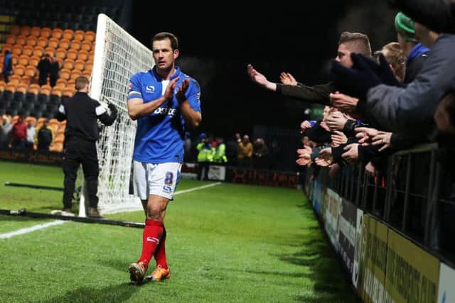 Michael Doyle faces flak from Pompey fans after the final whistle. Picture: Joe Pepler