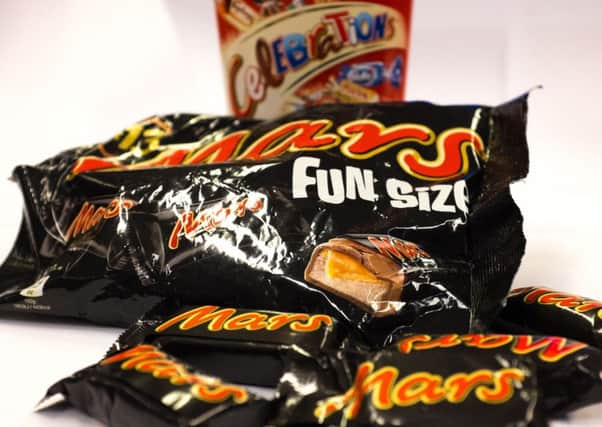 A general photo of a 'fun size' pack of Mars bars and a box of Celebration chocolates, as the confectionery giant has recalled some of its most popular chocolates in the UK after a piece of plastic was found in one of its products.
Picture: Stefan Rousseau/PA Wire