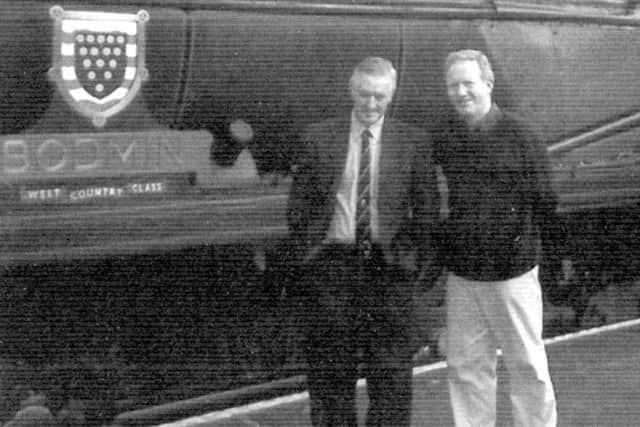 Michael (left) in later life with pal Frank Allen at Stratford-upon-Avon and still trainspotting.