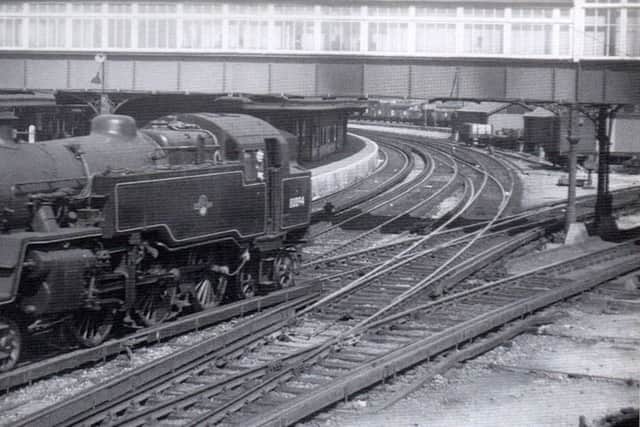 Where Michael was happiest, taking photographs from Goldsmith Avenue overlooking Fratton stations west end.