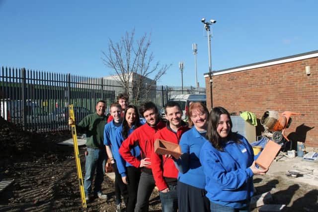 The building work at Toronto Place, Gosport. From left: Clay Meader, Ally Kemp, Tom Clark, Michaela Toms, Carl Stanton, Stuart Lovibond, Julie Barnes, Kirsty Cremer