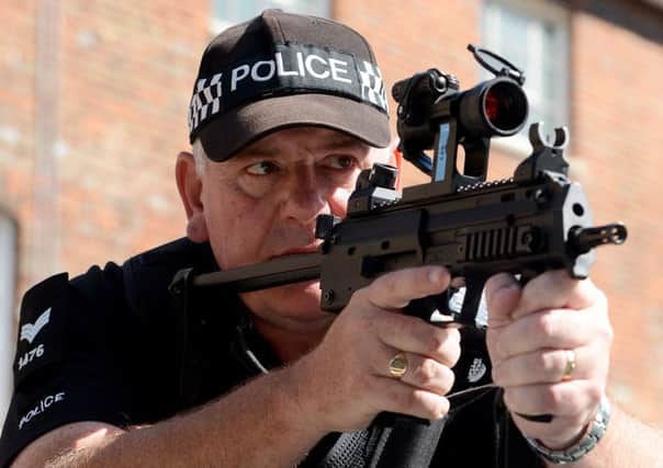 File image of an armed MoD police officer at Portsmouth Naval Base. Picture: 

LA(PHOT) Keith Morgan