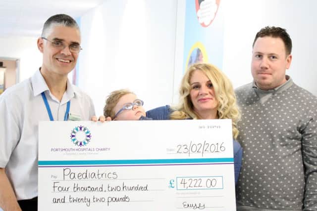 From left, Dr Roy Sievers, Noah, his mum Elisabeth, and dad Alex Yaxley Picture: Portsmouth Hospitals NHS Trust