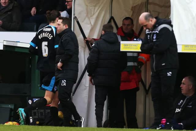 Christian Burgess leaves the field at Yeovil. Picture: Joe Pepler