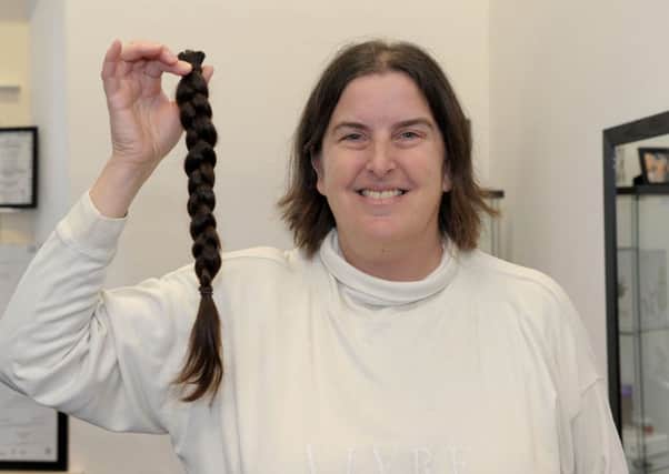 Vicki King had 17 inches of hair cut off at Unit 10 Hair Design in Gosport