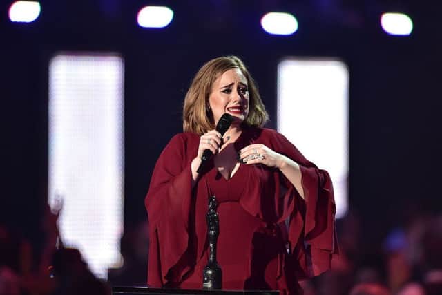 Adele collects the Global Success Award on stage during the 2016 Brit Awards at the O2 Arena, London
Picture: Dominic Lipinski/PA Wire