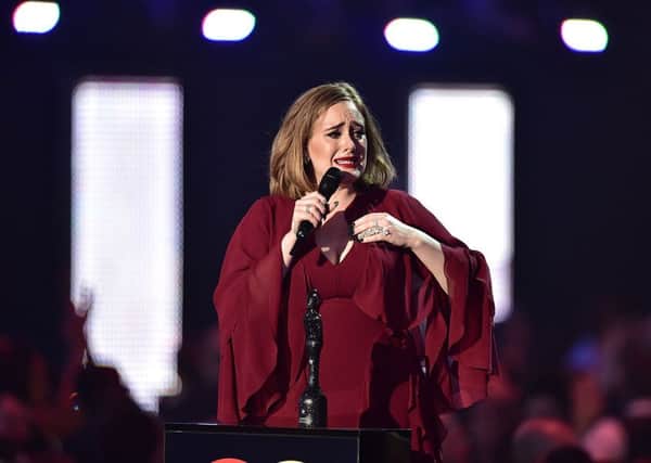Adele collects the Global Success Award on stage during the 2016 Brit Awards at the O2 Arena, London
Picture: Dominic Lipinski/PA Wire