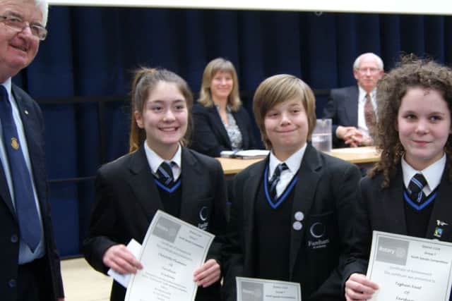 From left: Fareham Meon Rotary Club Vice-President Graham Lawrence with Charlotte Plummer, Thomas Anderson and Teghan Neat from Fareham Academy