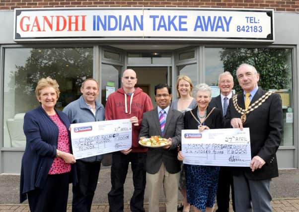 From left, pictured last year, are Doreen Allen, collecting money for Cancer Research UK on behalf of Timothy Haimes, landlord of The Heathfield Arms who ran the London Marathon; Paul Richards from Richards Newsagents; cancer patient David Bell from Fareham; owner of Gandhi's Abu-Suyeb Tanzam; Amanda Mahoney from The Rowans Hospice; The Mayoress of Fareham Pamela Norris; Cllr Leslie Keeble and the then Mayor of Fareham Cllr David Norris

Picture: Sarah Standing (150788-8154)