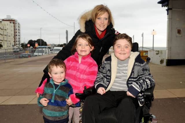 Joe Rush with his mum Annette and brother and sister Elliot and Emily Picture: Sarah Standing (160362-3658)