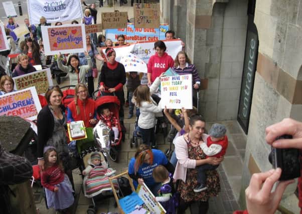 Protesters who campaigned to save Sure Start centres in Hampshire in 2011, pictured in Winchester