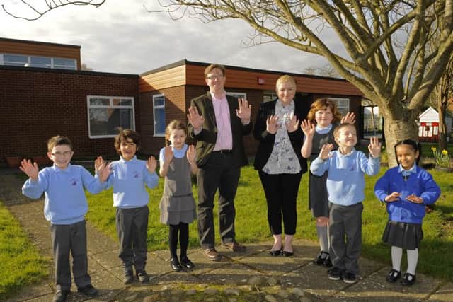 From left, Ben Hamza, Lorenzo Jay, Freyja Titcomb, Cllr Neill Young with headteacher Sonia Nickerson, Maggie Frazer, Tyler-James Dutton and Prabjot Kaur Picture:  Malcolm Wells (160224-8944)
