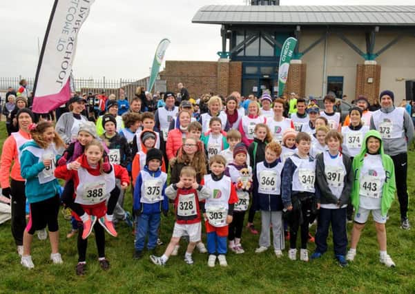 Youngsters from Ditcham Park School warm up  at the 

Race for Rowan 

Picture: Allan Hutchings (160376-338)
