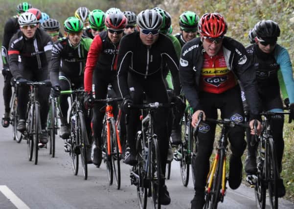 Ian Wilkinson leads his new Pedal Heaven team-mates on a training ride earlier this winter. Picture: Hugh McManus