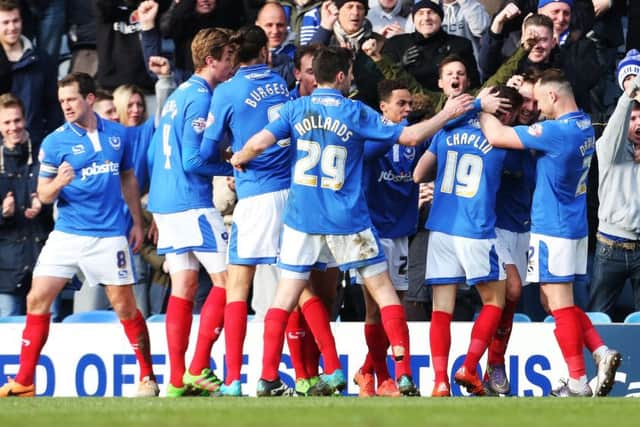 Pompey celebrate Marc McNulty's opener Picture: Joe Pepler