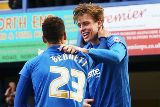 Kyle Bennett congratulates Adam Webster following his winner Picture: Joe Pepler