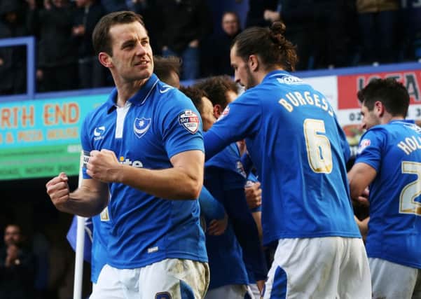 Skipper Michael Doyle led Pompey to victory Picture: Joe Pepler